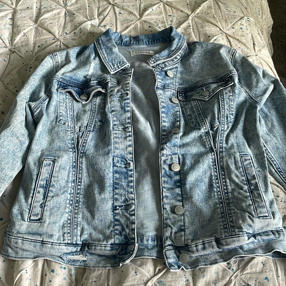 Denim jacket. With pockets. Size medium.